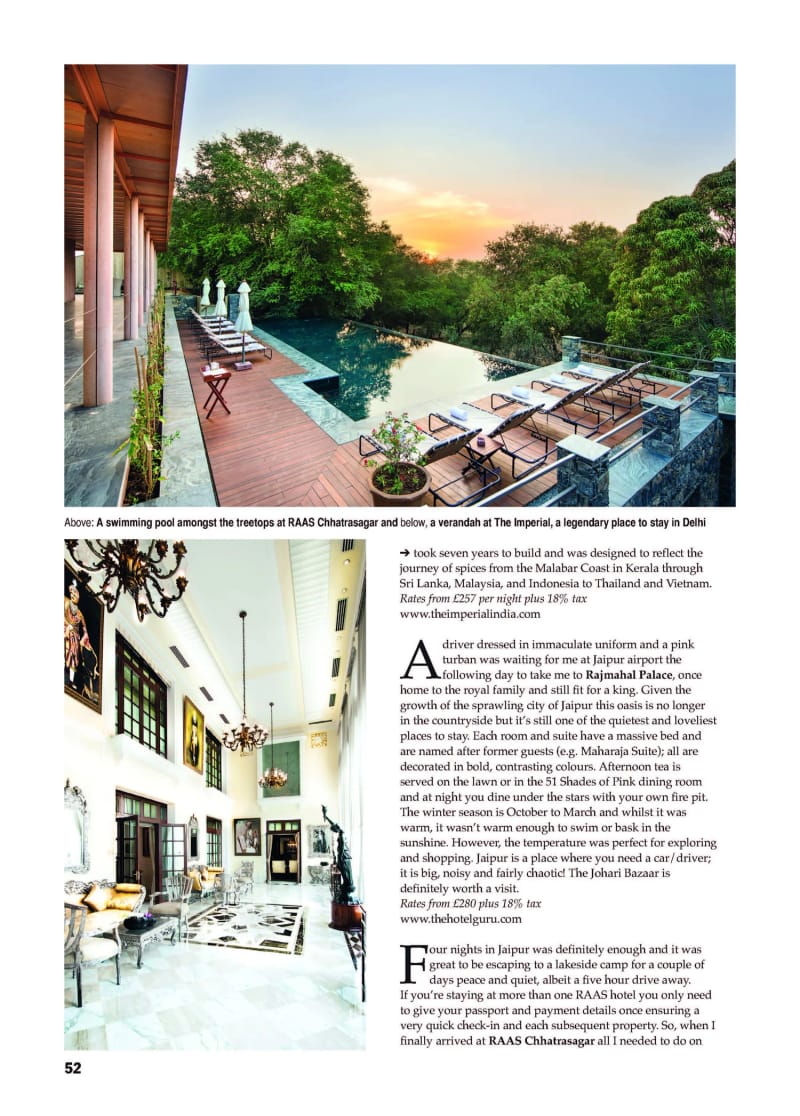 A Passage to India, swimming pool with lounge chairs and umbrellas at sunset