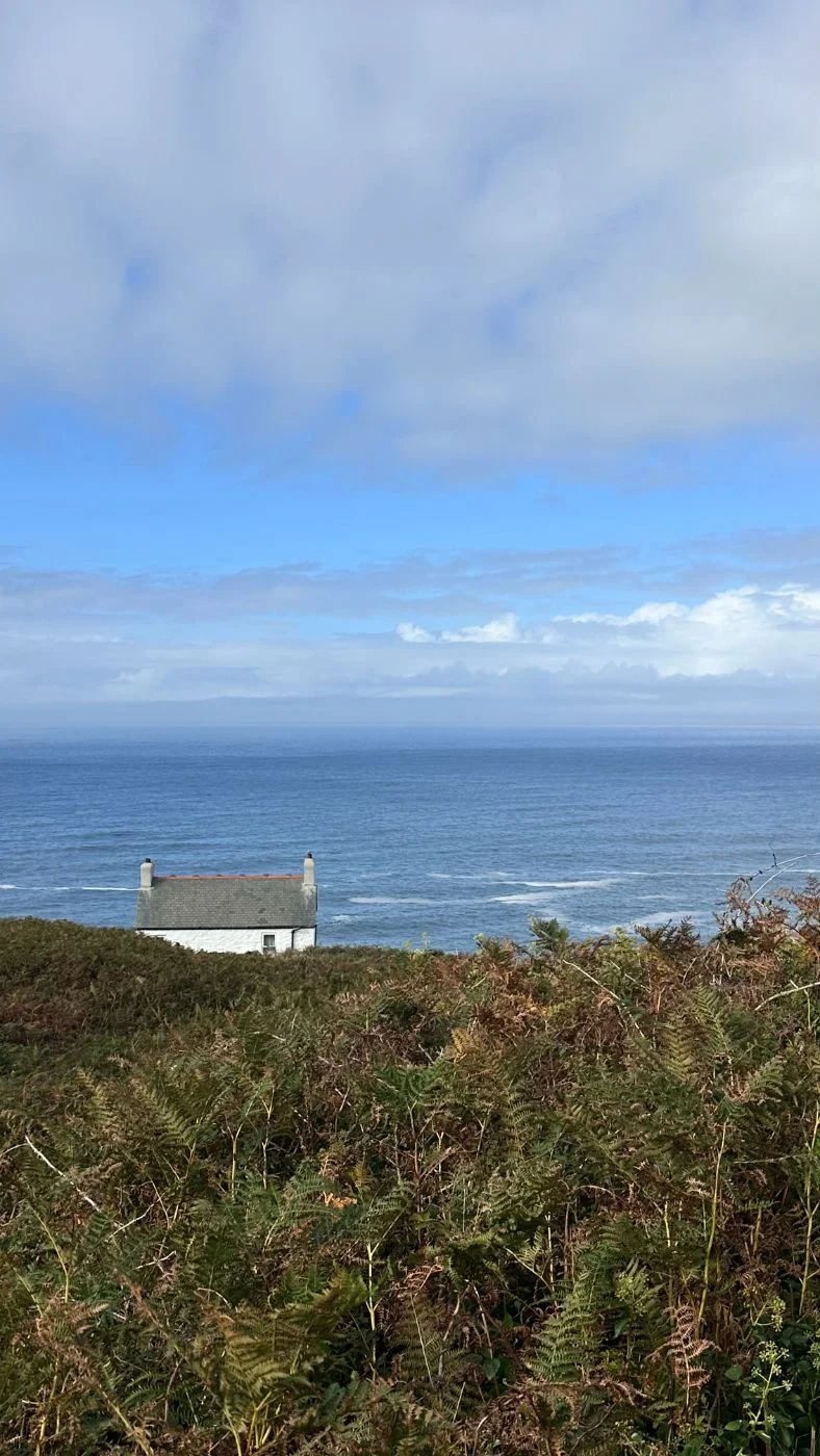 White cottage above the sea